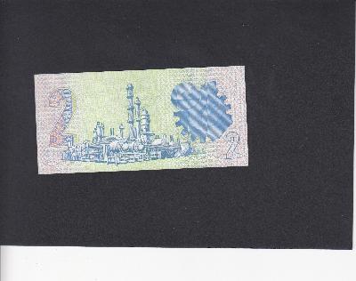 Beschrijving achterzijde: RAFINERY